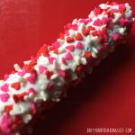 Make chocolate dipped pretzel rods with kids! Great for teacher and neighbor gifts. - doityourfreakingself.com