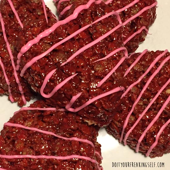 Gooey and delicious Red Velvet Rice Krispies Squares - or hearts if you're feeling fancy! - Doityourfreakingself.com
