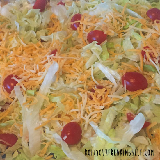 Quick and Easy Taco Dip. Perfect for any party - Doityourfreakingself.com