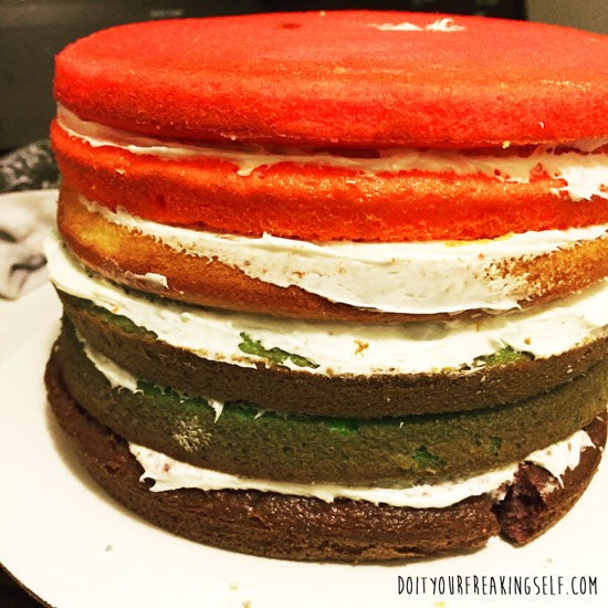 Impress your friends with a festive Rainbow layer cake! Super simple and amazing! - Doityourfreakingself.com