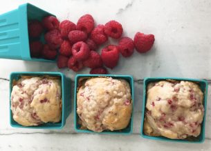 Ultra moist and dense Raspberry muffins made with greek yogurt and fresh raspberries. Delicious!