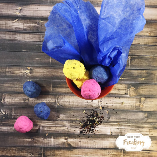 Quick and easy steps to make your own colorful seed bombs to throw and grow wild flowers. Great Earth Day crafts for kids and wedding favors.