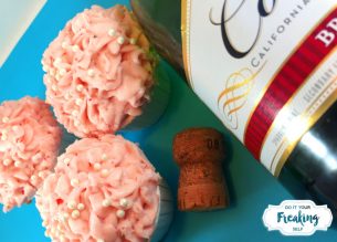 Champagne cupcakes with a fresh strawberry buttercream frosting. Doctored from a cake mix. Easy for everyone!