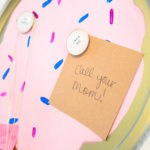 Use an old Pizza pan to create a one of a kind Sugar Cookie DIY Magnet Board. Sweeten up your command center!