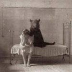 vintage-photos-woman-bear-bed