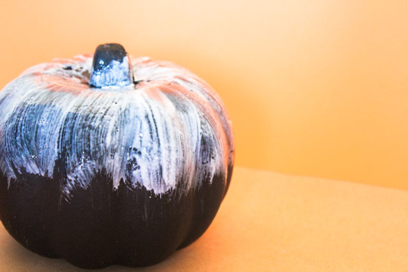 Transform foam pumpkins from the dollar tree into chic DIY Glitter Pumpkins for you halloween and fall decor! 