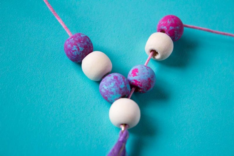 Learn how to paint wooden beads and use them to create fun diy napkin rings and necklaces for your Valentines or Galentines day brunch! | statement necklace | Upcycle | wooden bead crafts | marble paint | painted beads | Pink Party - Do It Your Freaking Self