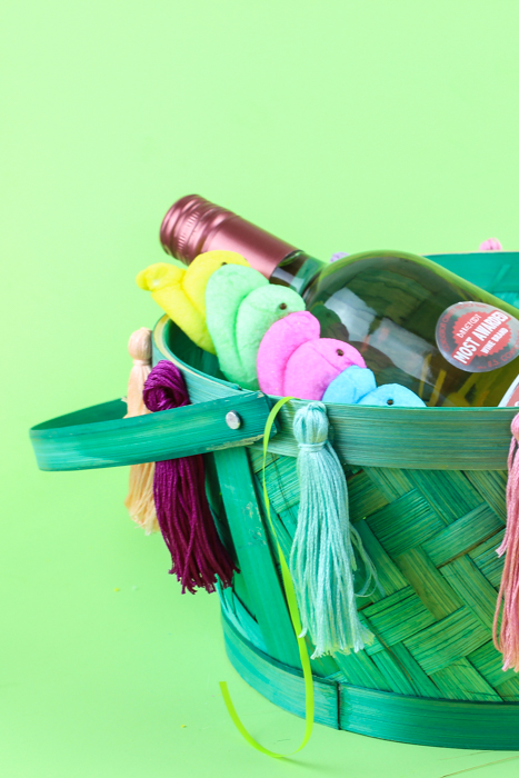 Spruce up a simple basket for your own DIY Tassel Basket for Easter! Perfect for a grown up look with all the fun you remember when you were a kid!