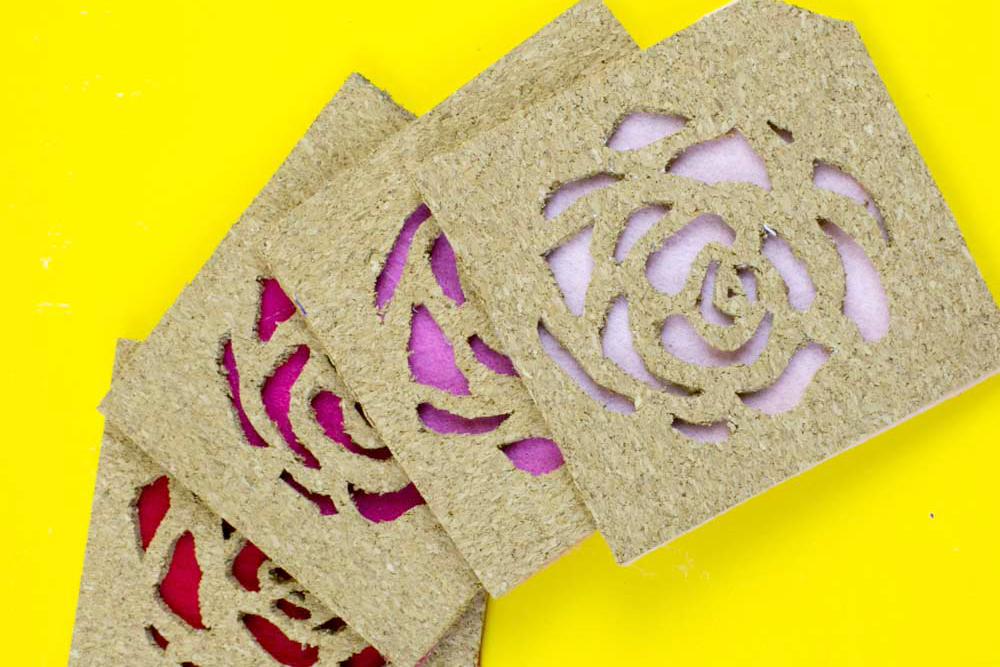 Use IKEA Avskild Placemats to create these simple rose cut out cork coasters for your next girls day or The Bachelor viewing party! - Do It Your Freaking Self - Cork Coasters | Custom Coasters | The Bachelor party | The bachelorette | Girls Day