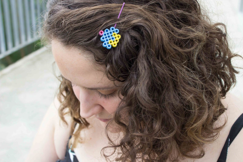 Add some fun to your hairstyle with a nostalgic twist! Learn how to turn mini cupcakes into adorable perler bead hair pins for the kid in all of us!