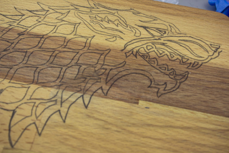 Create your own wood burned Game of Thrones Cutting Board with this easy tutorial. If you've ever wanted to try wood burning, this is a fun project to get you started!