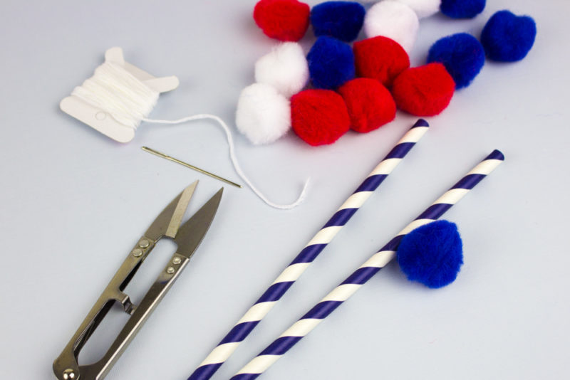Throw some pom poms into your Independence day celebrations with this unbelievably simple DIY 4th of July Pom Pom Cake Topper.