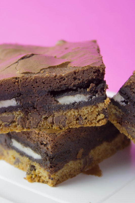 Treat yo'self to layers of delicious chocolate chip cookie, oreos and brownie batter! Indulge in some rich chocolate goodness with easy slutty brownies.