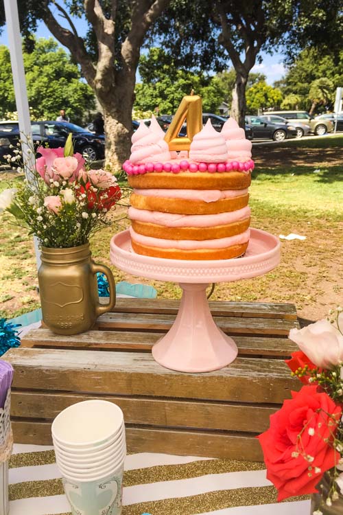 Create a simple yet impressive naked cake for the pinterest perfect tea party! Learn how to make a delicious tea party cake with this step by step tutorial.