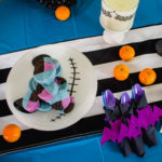 Host a Tim Burton Inspired Halloween Party! Loving the little details and pops of blue and purple that bring it together! - Doityourfreakingself.com - Halloween Tablescape, alternative halloween, nightmare before christmas, corpse bride