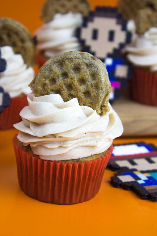 Sweeten up your Stranger Things party with these delicious Eleven's Eggo Cupcakes! Cinnamon nutmeg cake topped with maple syrup buttercream and a mini waffle! #strangerthings #eggocupcake #cupcake - Do It Your Freaking Self
