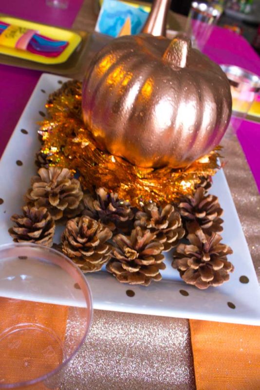 Give your Friendsgiving Tablescape a vibrant pop of color with bright orange, yellow, pink and rose gold! | #friendsgiving #thanksgiving #tablescape 