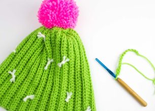 Whether you're a plant lady waiting to happen, or just have a deep love of all things cactus, this Crochet Cactus Hat Pattern is enough to make you swoon without getting prickly! | Do It Your Freaking Self | #CrochetHat #freePattern #cactusHat