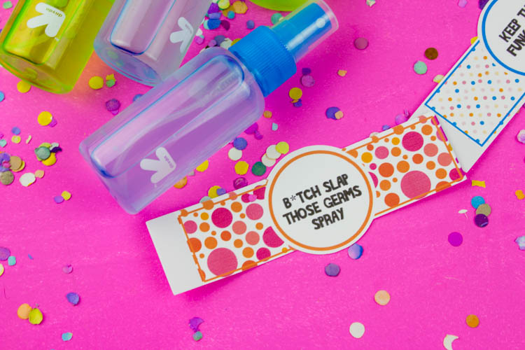 Keep germs away with this DIY Hand Sanitizer Spray and these fun colorful labels! Use your favorite essential oils for a fun seasonal gift! | Do It Your Freaking Self | #DIYHandSanitizer #wellness #essentialOils