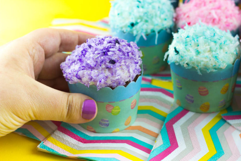 Gear up for spring with these Pastel Coconut SnoBall Cupcakes with decadent Marshmallow filling and frosting! Great for a spring table, Easter brunch or just because! | Do It Your Freaking Self | #EasterCupcakes #Coconut #Marshmallowfrosting