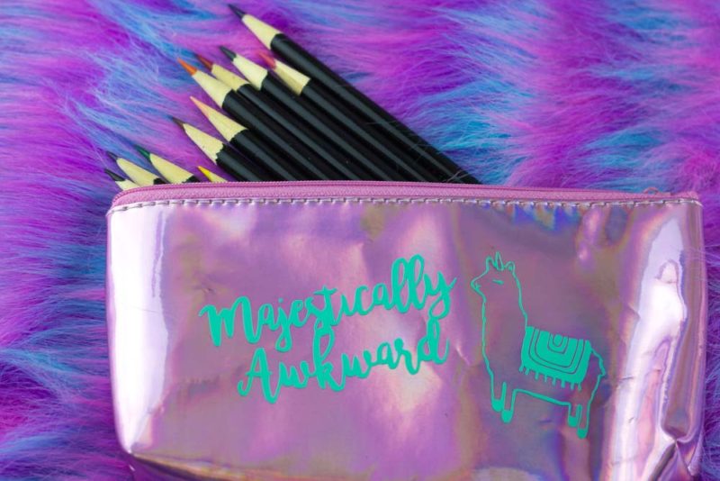 Express fabulous self with a fun Magestically Awkward Llamacorn Pencil Bag. Make custom holographic pencil bags for your fabulous self and friends!  | #GiftIdea #SchoolSupplies #llamacorn #CutFile