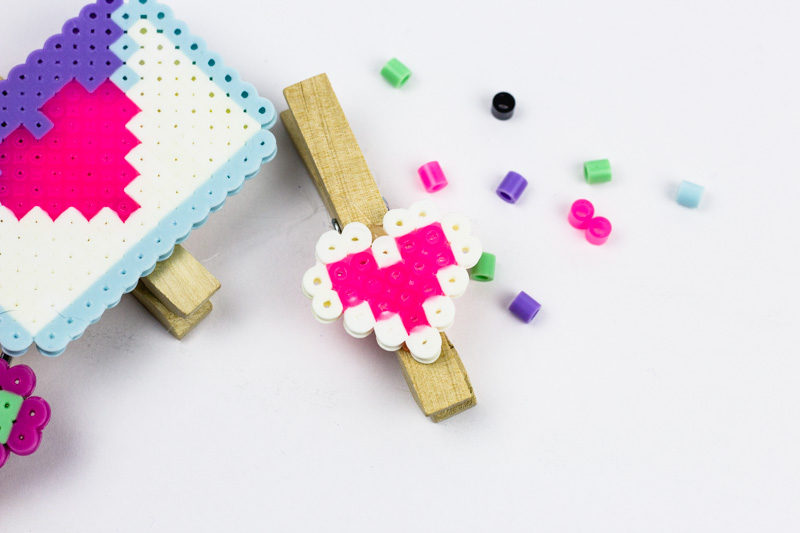 DIY Valentines Bag Clips are a fun and engaging way to add charm and festive touches to your kitchen organization efforts! | #perlerbead #pattern #valentinescrafts